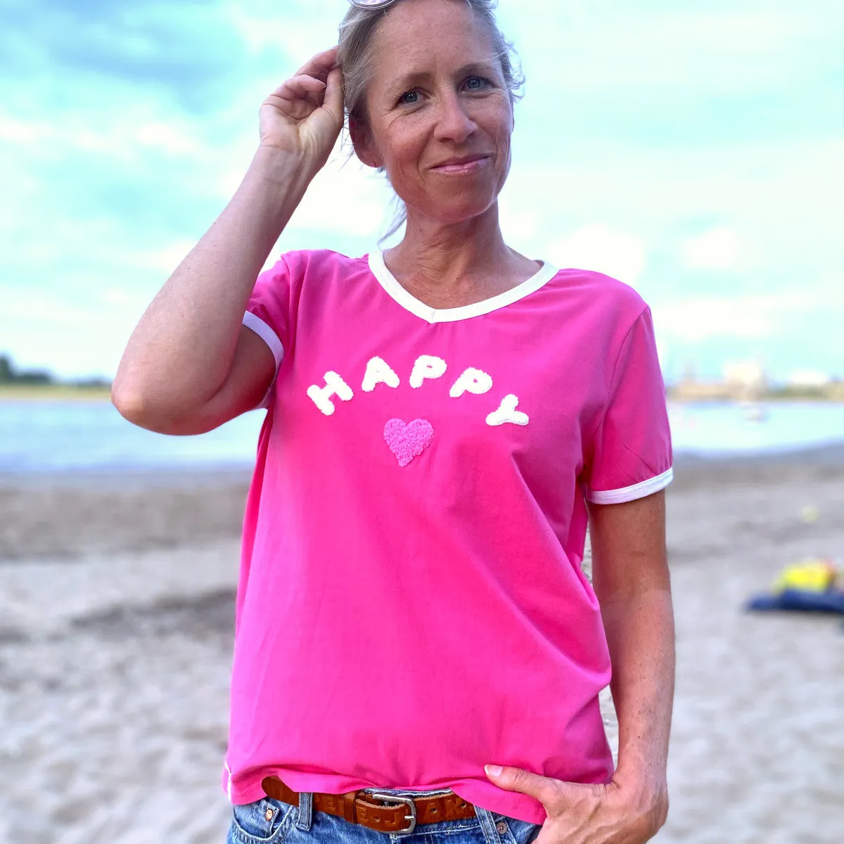 Herzlein® T-Shirt mit Flausch-Stick "HAPPY" in Pink