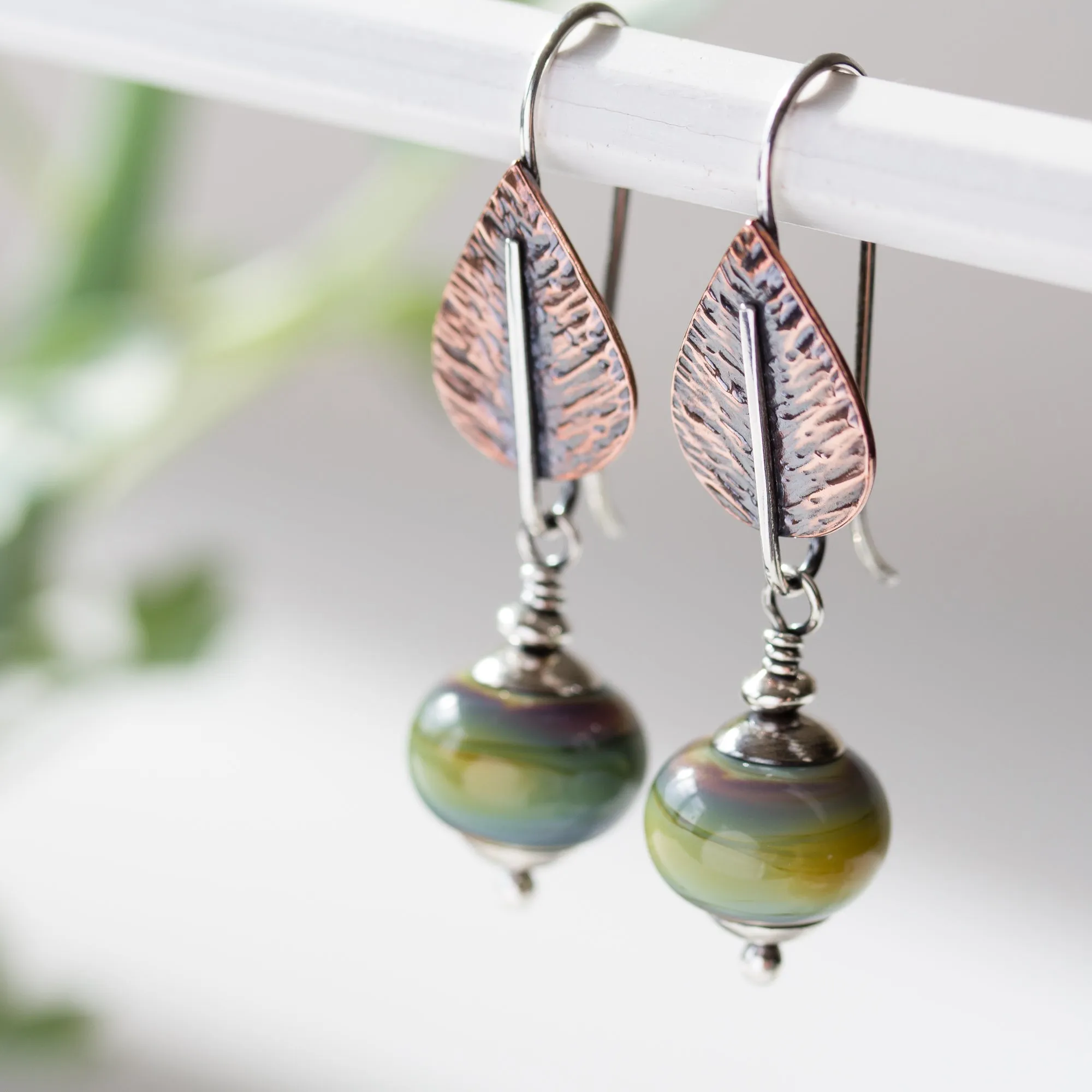 Pastel Green Earrings, hammered copper leaf with lampwork beads