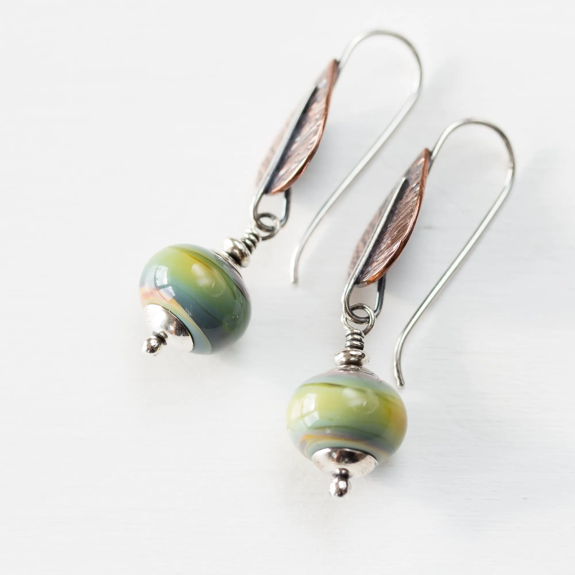 Pastel Green Earrings, hammered copper leaf with lampwork beads